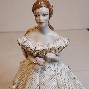 Vtg porcelain beauitful doll sitting on pretty chair. perfect condition